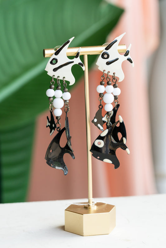 1980s black and white painted metal and bead fish earrings